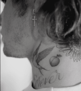 Justin Bieber new Peach neck tattoo Justin Bieber new Peach neck tattoo