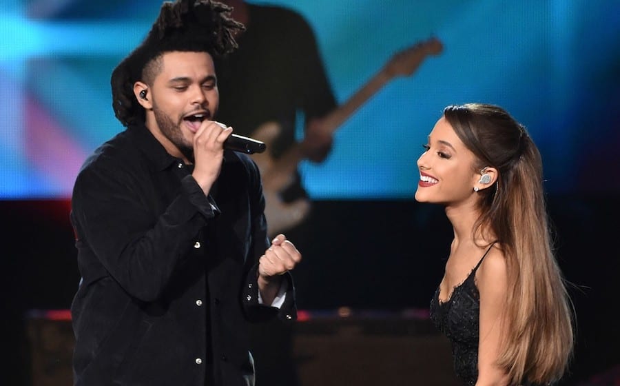 The Weeknd and Ariana Grande perform onstage at the 2014 American Music Awards at Nokia Theatre L.A. Live on Nov. 23, 2014 in Los Angeles.